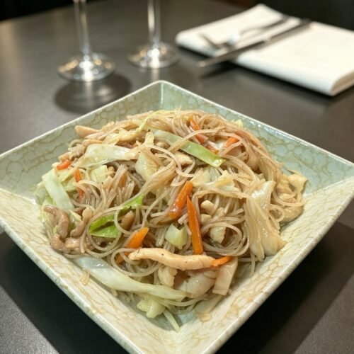 027.Fideos de Arroz Fritos con Tres Delicias